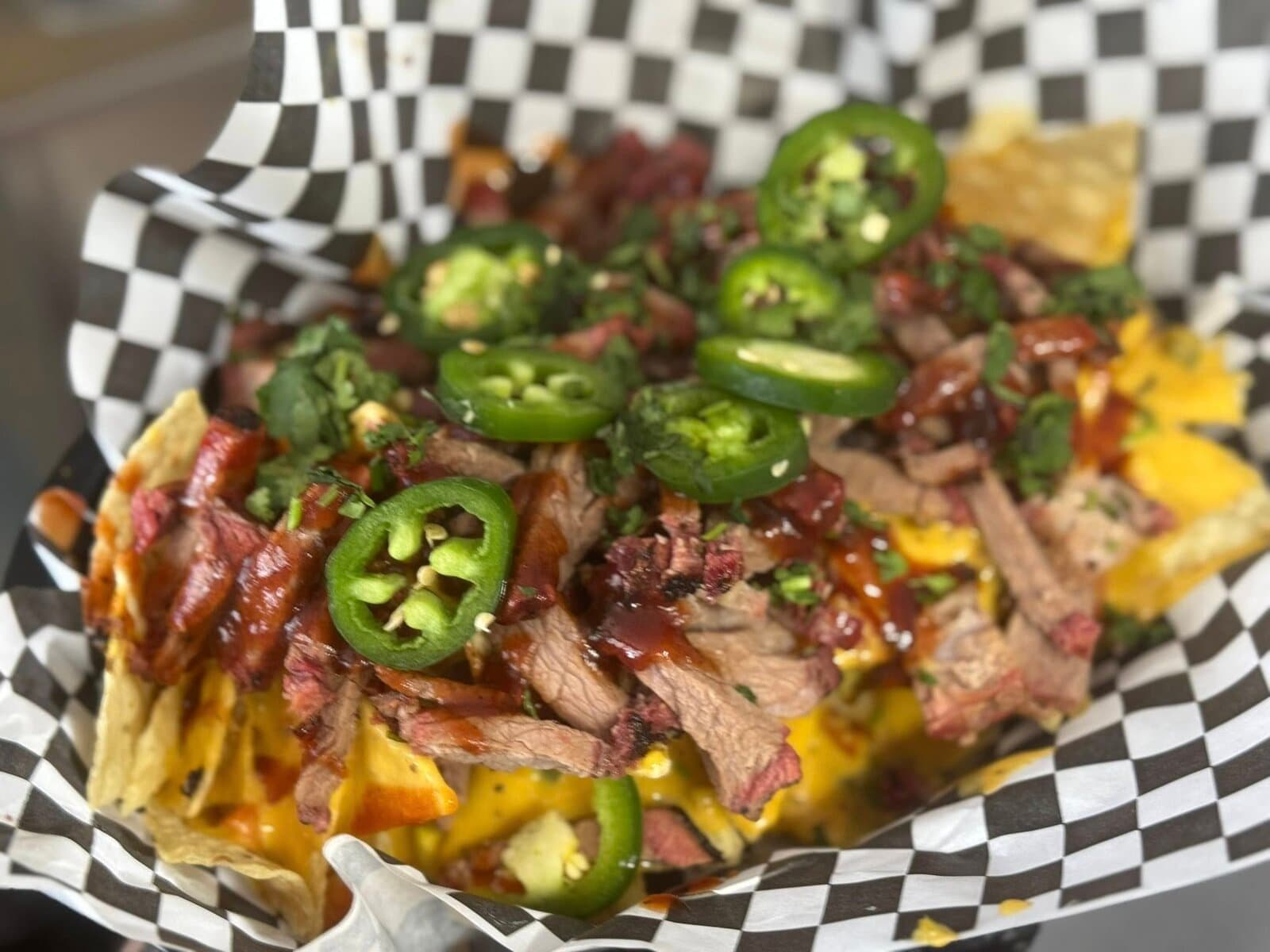 Brisket nachos with jalapeños and cheese